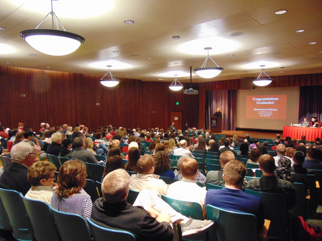 Wisconsin Historical Society auditorium packed with graduates and their families for 2019 Graduation Reception and Awards Ceremony