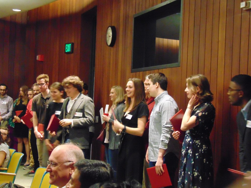 Students and their families mingle during the History Department Graduation Reception at Wisconsin Historical Society