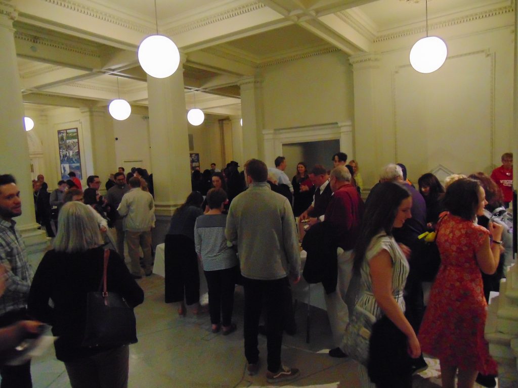 Students and their families mingle during the History Department Graduation Reception at Wisconsin Historical Society