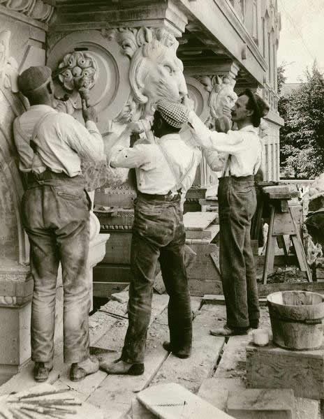 Stone cutters, probably Italian, working on the Library Mall entrance of the State Historical Society building (816 State Street).