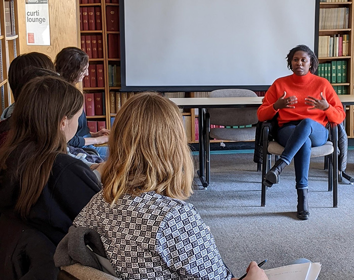 Jillian Stacey (Class of 2015) speaks with students in History 300