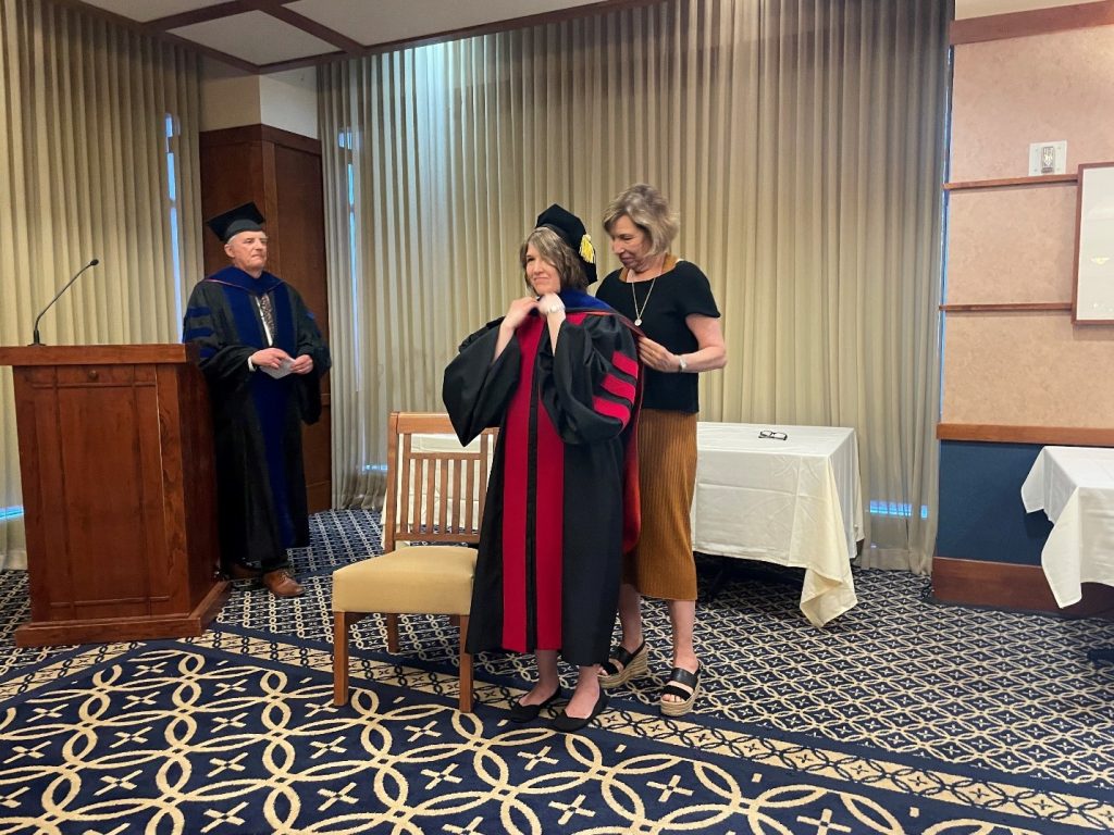 Pictured: Kayci Olson Harris, PhD with Professors Laird Boswell and Mary Lou Roberts