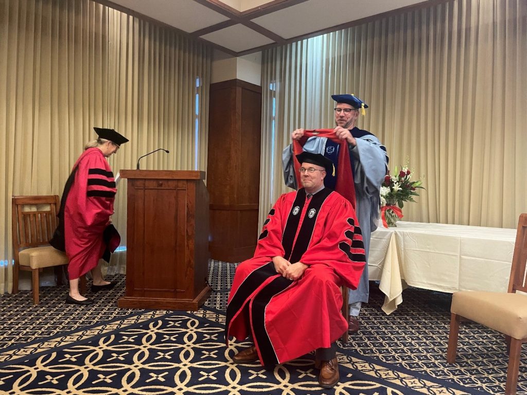 Pictured: Brian C. North, PhD with Professor John Hall