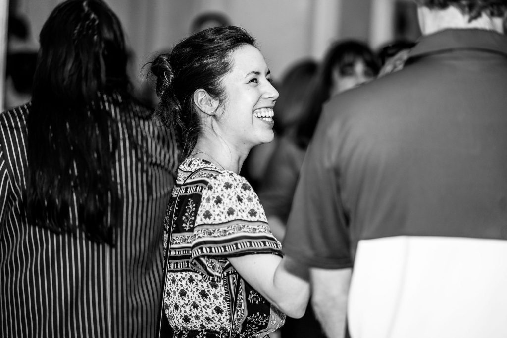 Families celebrate with graduates at the reception.