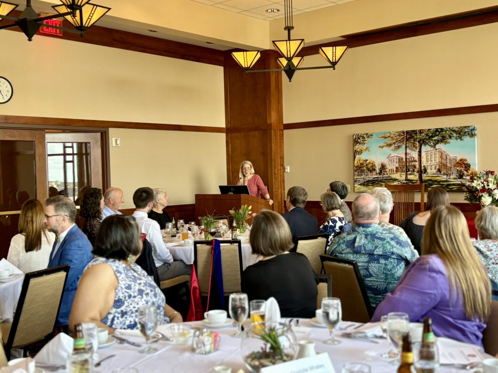 Anne Hansen (Department Chair) speaking at graduate celebration event