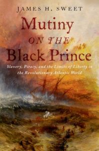 Cover image for book entitled "Mutiny on the Black Prince: Slavery, Piracy, and the Limits of Liberty in the Revolutionary Atlantic World" by James H. Sweet. The book was published by Oxford University Press in January 2025. The cover features an image of a shipwreck on a stormy sea. The picture is a painting with an intensely red and orange sky. At the forefront of the image are items floating in the water; hands can also be seen reaching up.