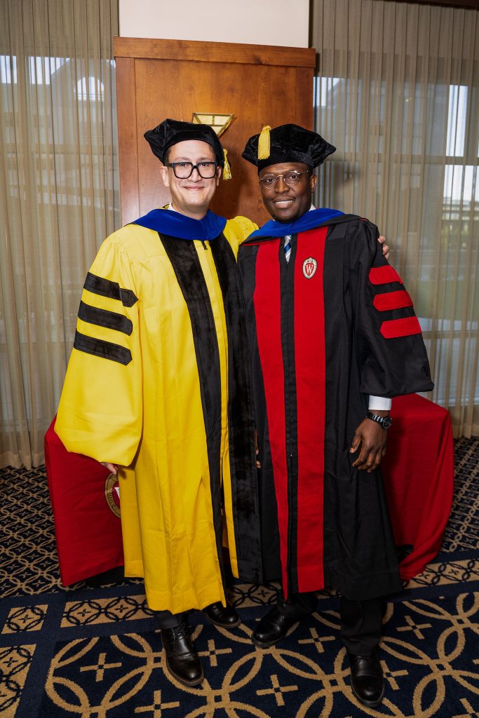 Ayodeji W. Adegbite, HSMT PhD, with Prof. Pablo Gómez, representing Prof. Emeritus Gregg Mitman (History of Science, Medicine, and Technology)